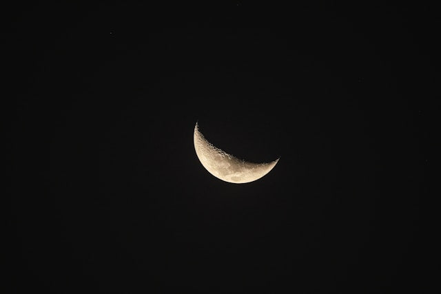 New Moon in Taurus in the night sky symbolizing new beginnings